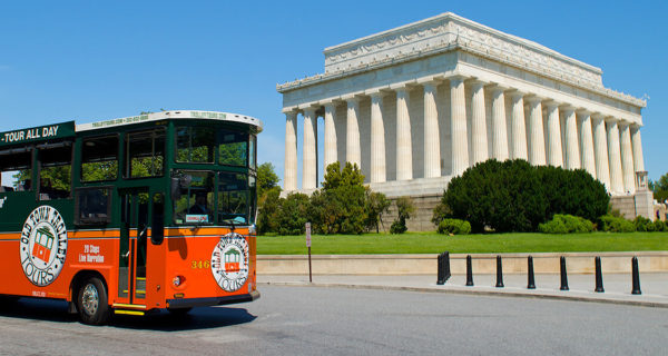 Old Town Trolley Tour driving past Lincoln Memorial