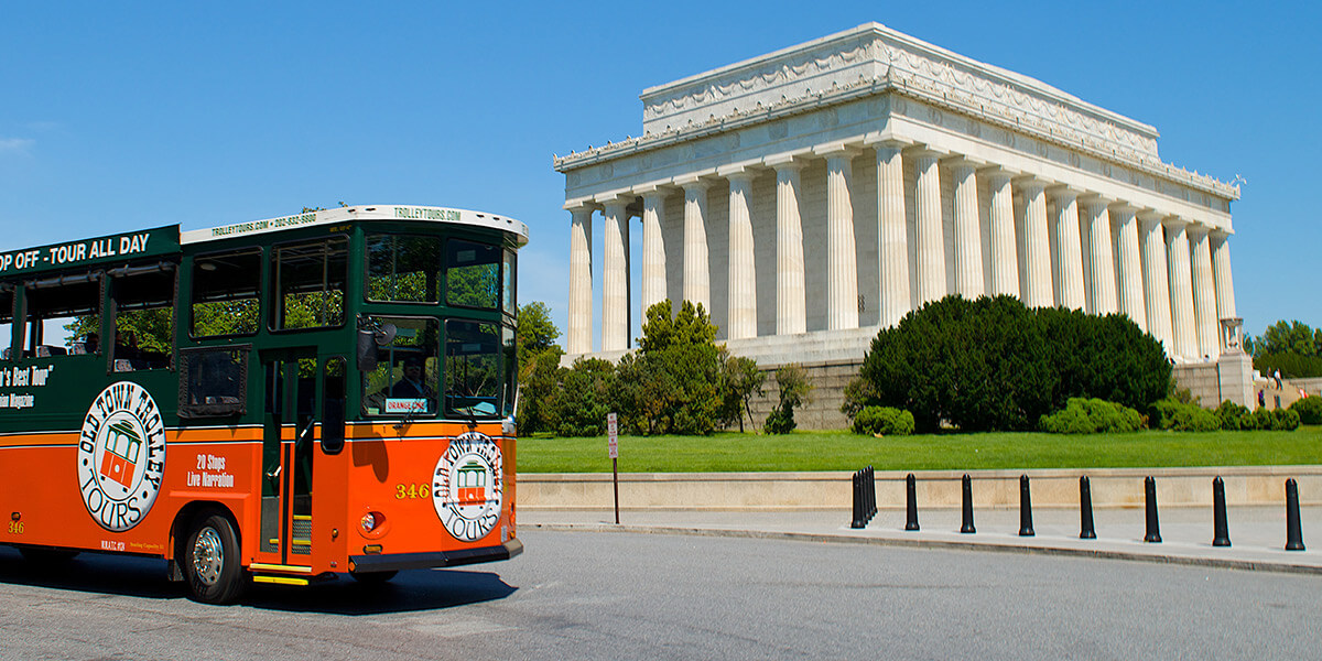 Old Town Trolley Tour driving past Lincoln Memorial