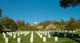 View of Arlington House made up columns in the background and tomb stones in foreground