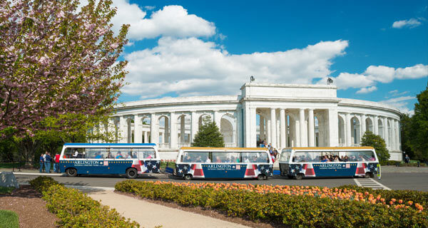 Arlington Cemetery Tours vehicle driving past amphitheater