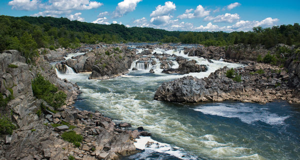 Great Falls Park featuring a river, falls and mountains