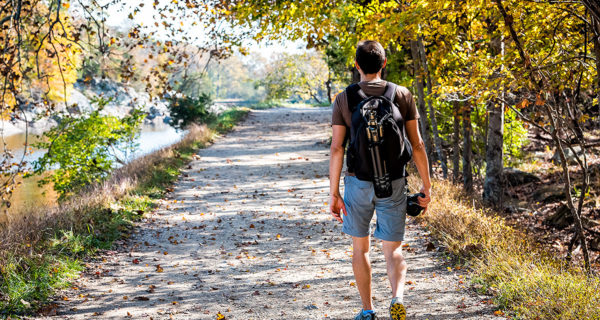 young man walking Potomac Heritage Scenic Trail