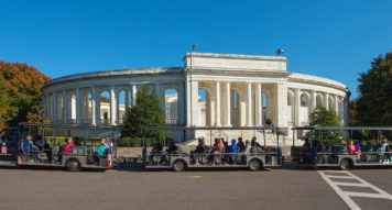 Arlington Cemetery Tours vehicle driving past amphitheater