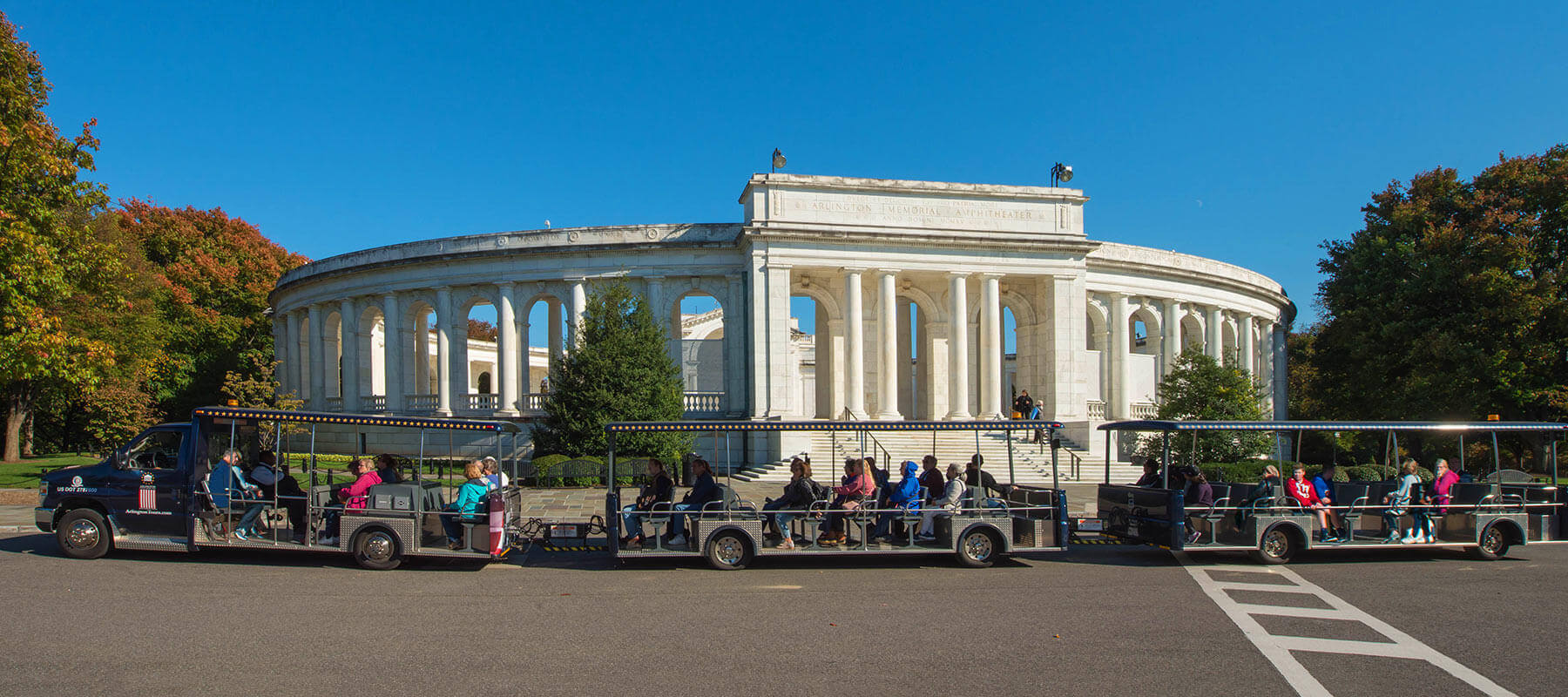 Arlington Cemetery Tours vehicle driving past amphitheater