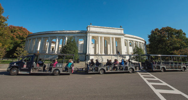 Arlington Tours vehicle driving past amphitheater