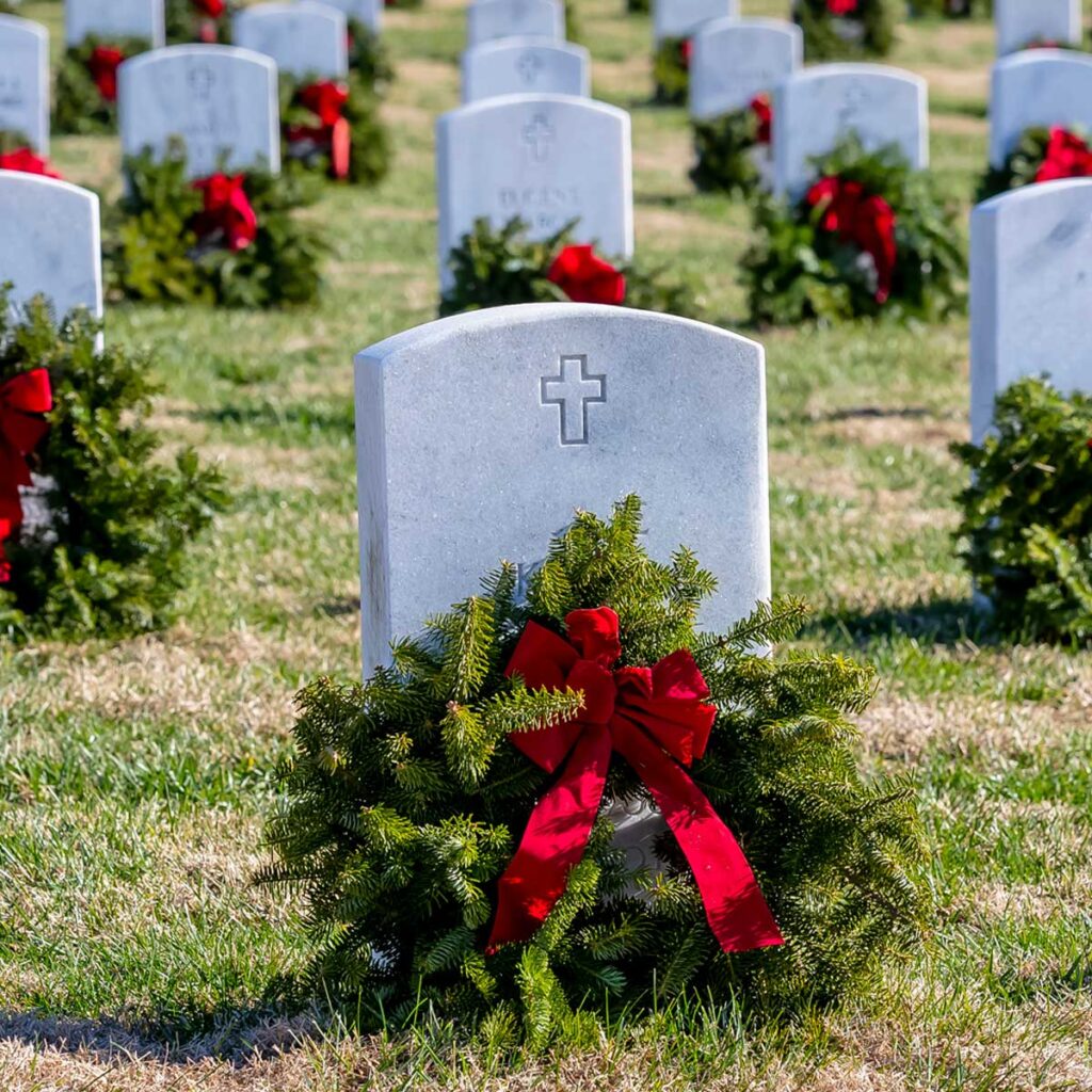 wreaths on graves at arlington national cemetery