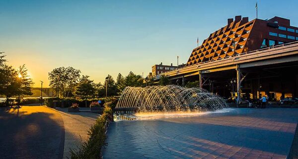 Georgetown Waterfront Park with vibrant trees, pathways, and the Potomac River