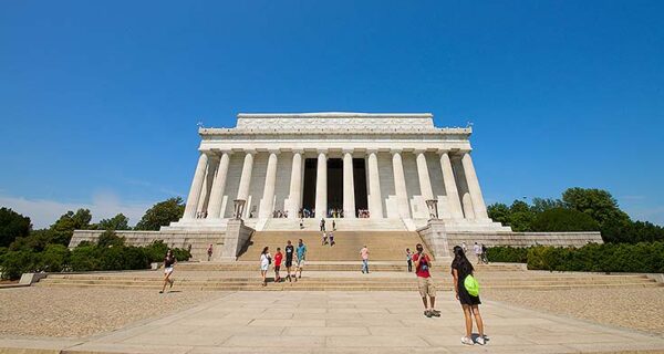 Lincoln Memorial, a large marble structure, features a seated Abraham Lincoln statue
